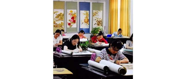 用烙画艺术 展现移民精神